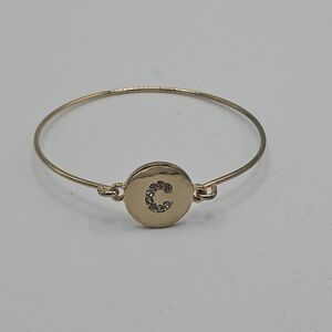 gold tone bangle bracelet with rhinestone C initial